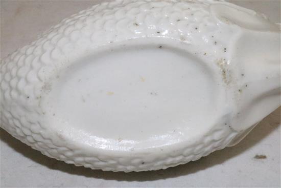 A soft paste porcelain dolphin sauceboat, 18th century, possibly Saint-Cloud or Mennecy, length 14.5cm (5.7in.)